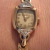 Is this gold filled or 14K and what is the time period. 