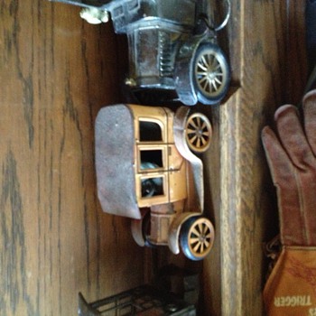 Old toy vehicles one with rear wheel lever actuated drive - Model Cars