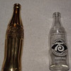 2 Coca Cola bottles