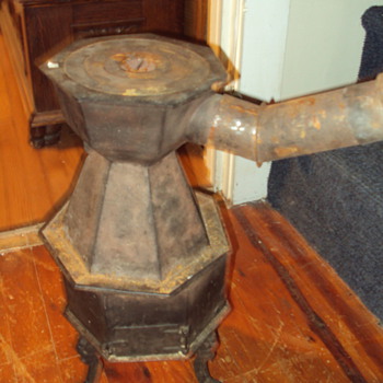 Info Needed  8 sided Cast iron Stove Germany? For heating Sad Irons ? 