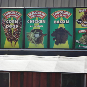 Store signs Food or eat at your own risk :-) - Photographs