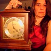 SETH THOMAS MANTLE CLOCK WITH CHERUBS IN 4 CORNERS THREE KEY WHOLES WITH KEY NEED TO KNOW DATE AND VALUE OF ITEM