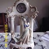 Lux Porcelain Statue Clock