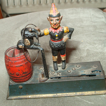 Norman  by Hubley with solid base in original polychrome paint, 