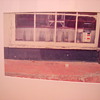 William Eggleston "Bottles In Window" photo.