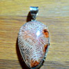 Strange stone and silver pendant