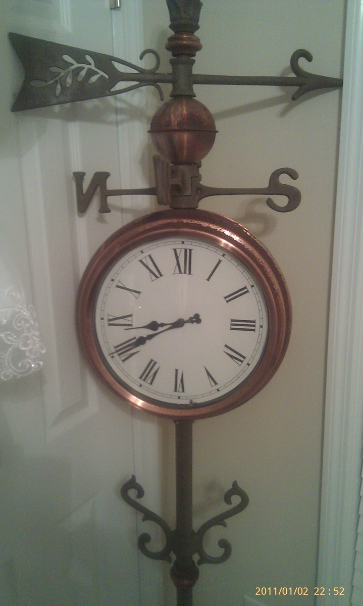 weathervane/ double sided clock/ temperature gauge Collectors Weekly