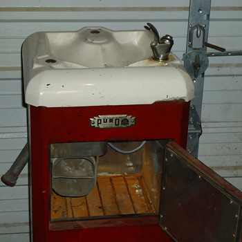 Vintage porcelain drinking fountain with icebox