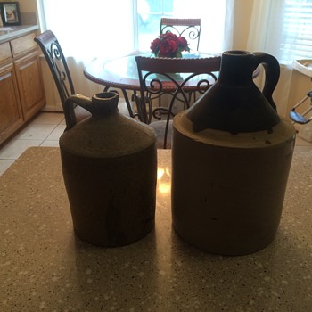 Old whiskey jugs. - Bottles