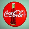 Coca-Cola button sign