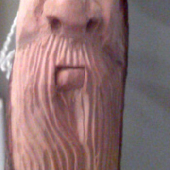 Face  carved walking stick 