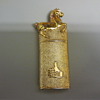 Gold lighter with Chinese symbols
