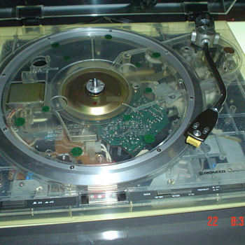 3 Turntables and some records