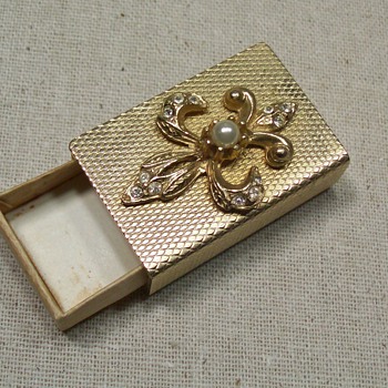 gold colored matchbox