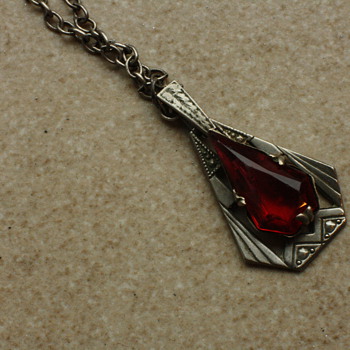 Art deco pendant with red stone