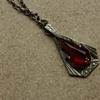 Art deco pendant with red stone