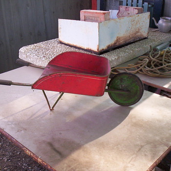Toy wheel barrow