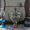20th century samovar with vintage oil lamp and vintage enameled coffee pot