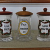 Set of three  handpainted Apotheycary jars Marked with letter M