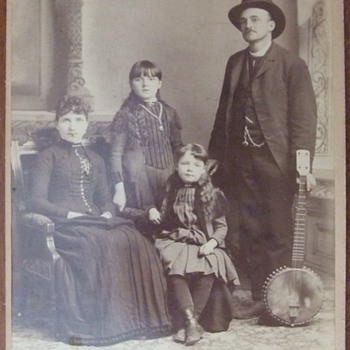 Cabinet card of man with a Banjo c. 1880 - Photographs