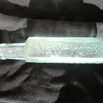 Glass Bottle rectangle with writing on each side