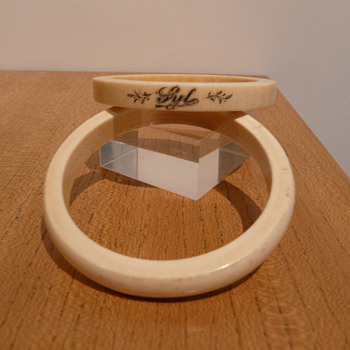 TWO IVORY BANGLES 