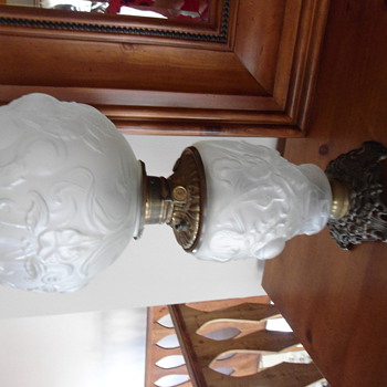 What is this? I have this beautiful oil lamp with frosted glass and peaches/vines. Stamped "Made in US of America" on oil switc