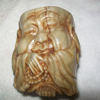 Old guy on a cup - Asian