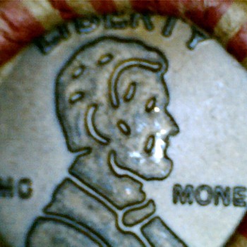 Unknown coin found in roll from bank box