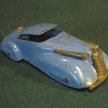 Marx 30s pressed steel Coupe with wooden gas cap. 
