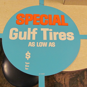 Gulf N.O.S. tin tire display sign