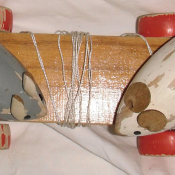 Mice move as you pull toy how old & from which co or hand made?