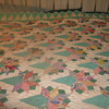 wedding bouquet quilt, 9 foot by 8 foot, fits king size bed.. the backing and border have been done 2011, boquets hand done.