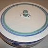 Pretty stoneware bowl with a bee on the lid.