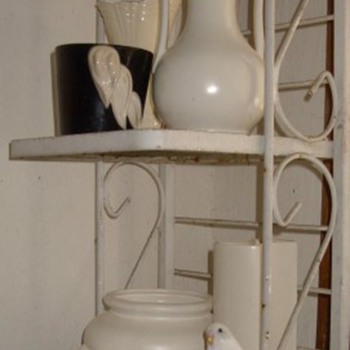 Cumi camoflage on my white pottery rack and some other bird stuff