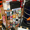 Delco battery display and oil cans