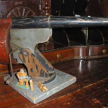 Depression era rapid fire cannon. Wood and pressed steel. 