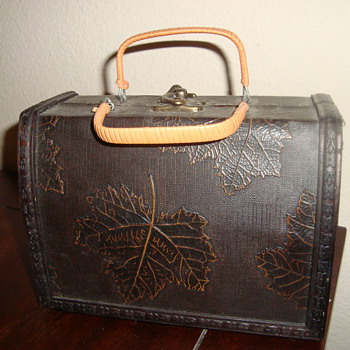 I bought this at a church sale for 15 $, I thought it was so rad, looked very old and Im thinking its maybe a handbag?
