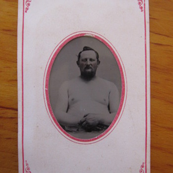 Why do you think this man is bare chested?