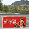 Coca Cola masonite sign