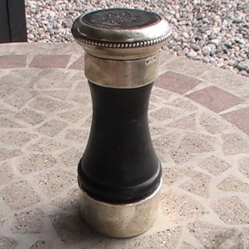 Really Neat salt and pepper mill in 1 Sterling wood.