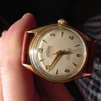 VINTAGE 18 KT. GOLD SWISS WATCH