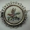 Micro Mosaic Brooch depicting a bird on a branch set in silver.