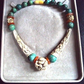 Where is this ivory, turquoise and carnelian necklace from?