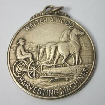 1904 Walter A Wood Harvesting Machines St Louis Worlds Fair Watch Fob