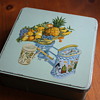 Tin with Fruit and Scale