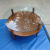 midcentury 2 tier coffee table. glass and wood with brass finials