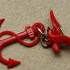 Red anchor and bird brooch