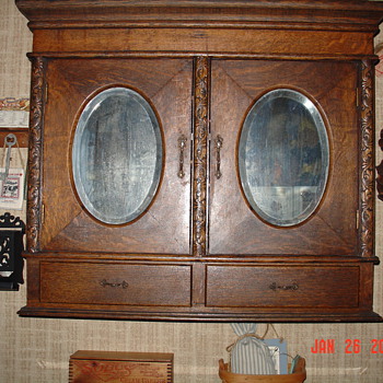 Antique Oak Two Door Cabinet...Beveled Oval Mirrors...Two Drawers With Key - Furniture