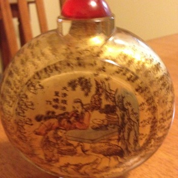 snuff bottle has picture and chinese or japanese writing on it very interesting want to know more about it please